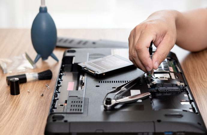 a professional restoring an electronic device