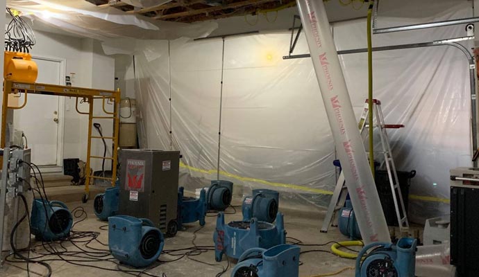 Water damage restoration with equipment