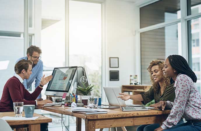 Employees working in a healthy office environment