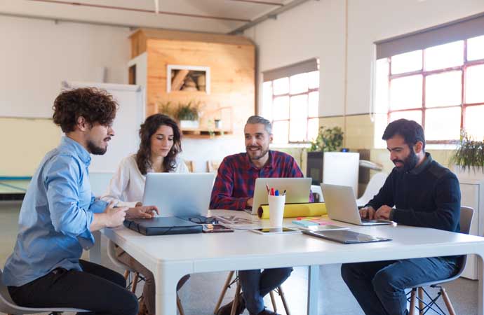 Employees working in a healthy office environment