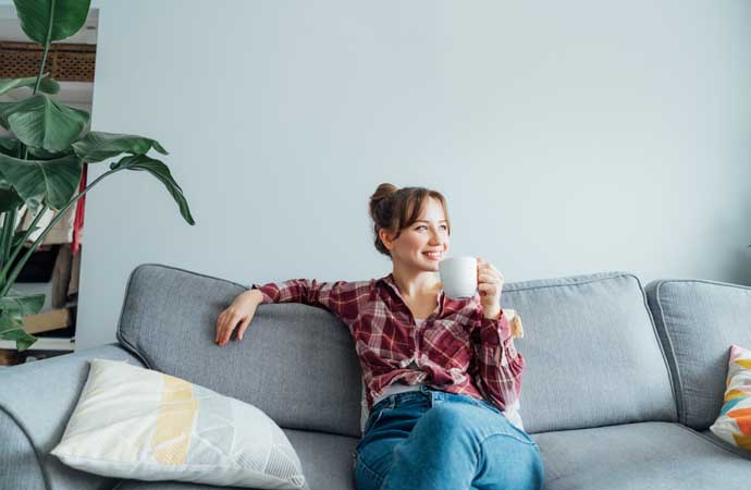 A women relaxing in a room