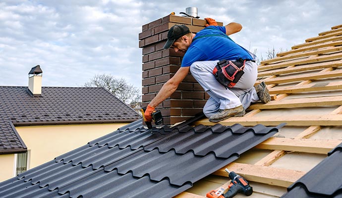 A skilled technician is fixing the roof.