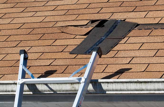 Close-up view of a damaged roof